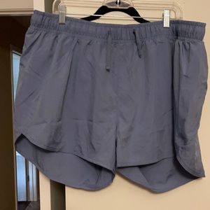 NWT 3” inseam Dolphin Hem hidden pocket draw string running shorts
